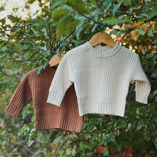 two sweaters, walnut brown and vanilla knitted sweaters